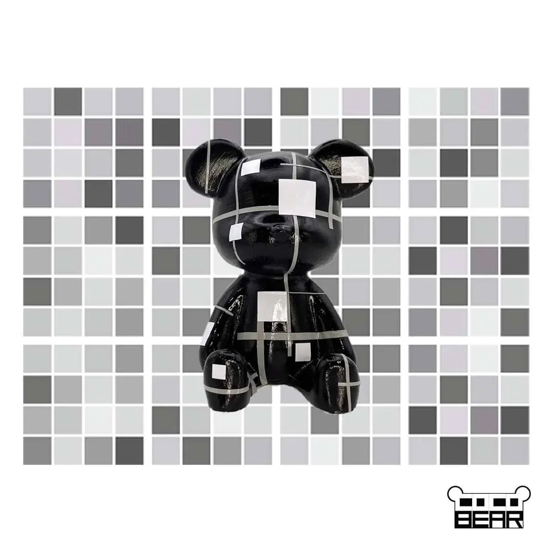 Black bear figurine with white geometric patterns, modern home décor accent piece