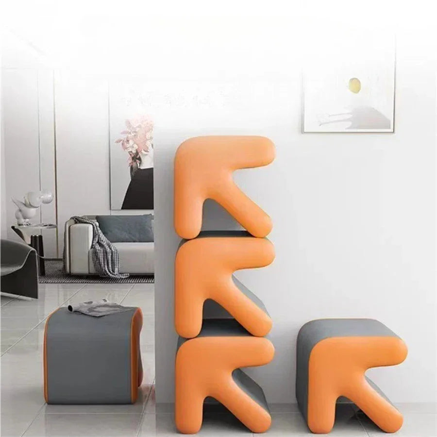 Modern orange and gray stools in a room setting