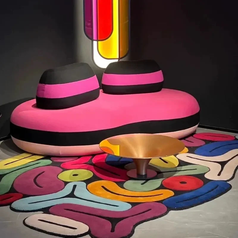 Artistic Irregular Plush Carpet with a pink and black chair on a dark background