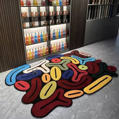 Artistic Irregular Plush Carpet on a gray floor with shelves in the background
