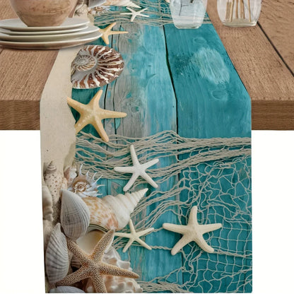 Table runner with starfish, shells, and fishing net design on a wooden table.