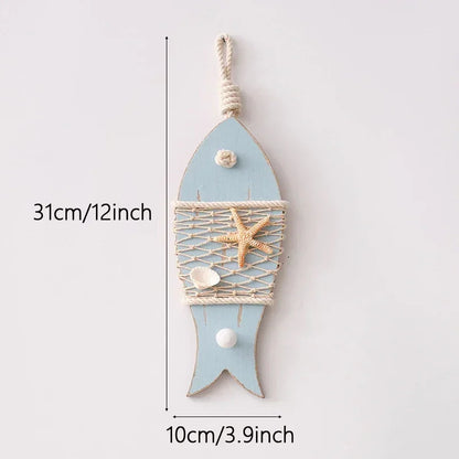Decorative wall hanging shaped like a fish with measurements on a white background