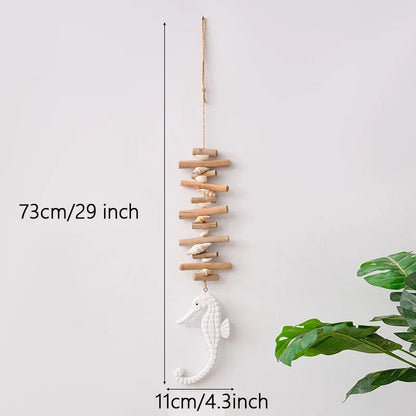 Decorative wall hanging with seahorse and wooden sticks, measurement details on a white background.