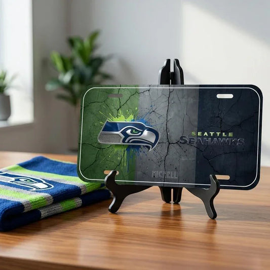 Seattle Seahawks license plate with stand on a wooden surface