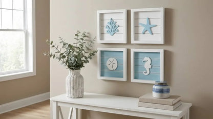 Nautical-themed wall art with starfish, seahorse, and sand dollar designs on a beige wall.