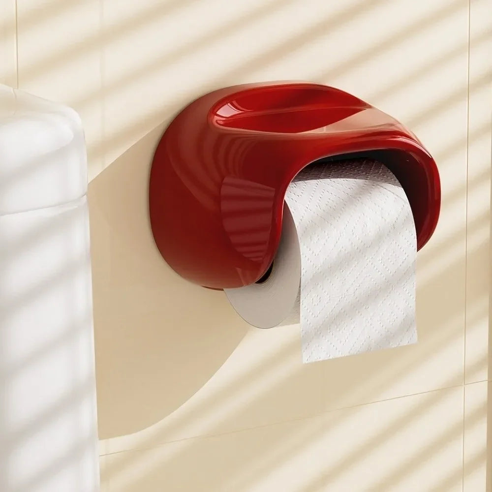 Red Vintage Roll Holder with a roll of white paper towels on a beige wall.