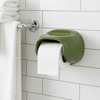 Green Vintage Roll Holder mounted on a tiled bathroom wall with toilet paper hanging out.